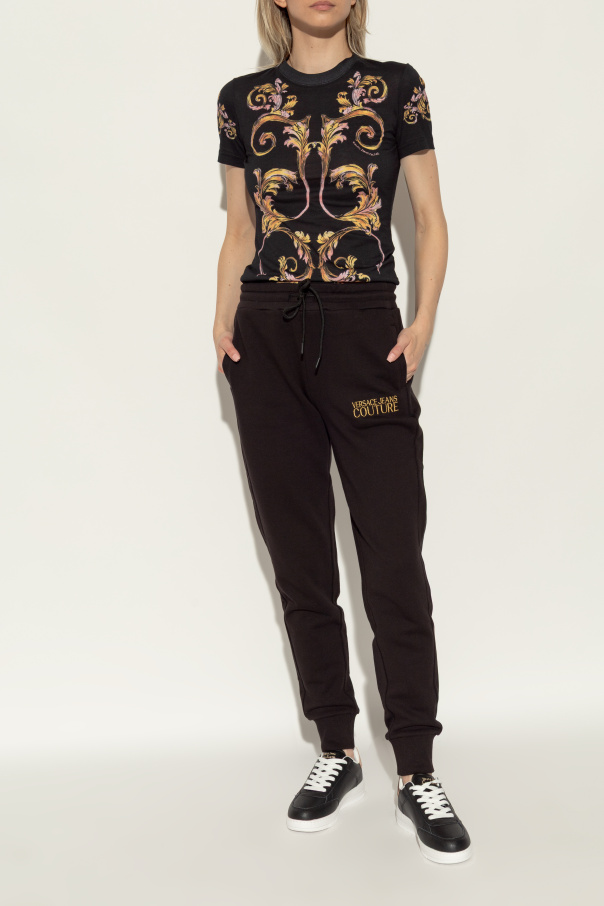 スニーカー VERSACE JEANS COUTURE Woman Sneakers Black 78VA3SJ5ZPB10 899 Dynamic Logo Sneakers Black,Gold | VERSACE US